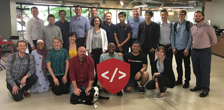 Vinicio Sanchez's picture with a Code Fellows Cohort